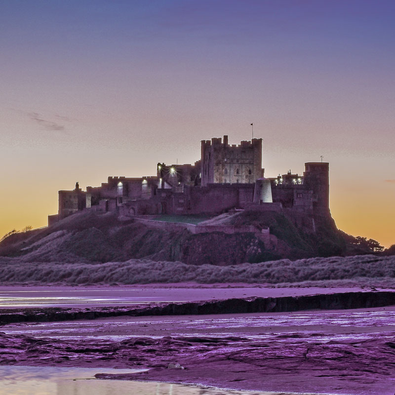 Sunset at Bamburgh Castle in Northumberland.